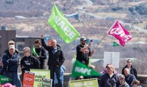 NAPE an CUPE flags at a rally