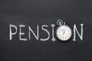 Photo of a chalkboard with the word pension written on it.